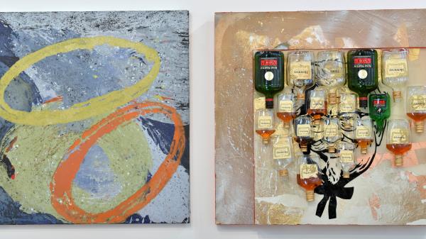 A canvass, left, by Allie McGhee, named, 'Cosmic Rings,' with glass cognac bottles, right, by Tony Rave named, 'The co<em></em>lonel,' Wednesday afternoon, March 8, 2023.