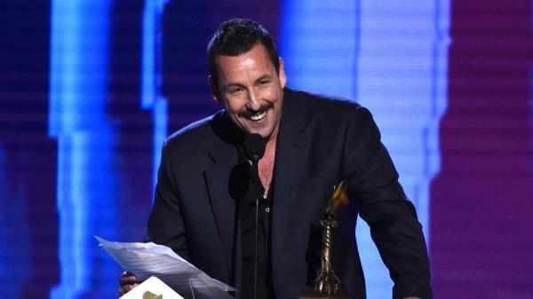 Adam Sandler accepts the award for best male lead for "Uncut Gems" at the 35th Film Independent Spirit Awards on Feb. 8, 2020, in Santa Monica, Calif.