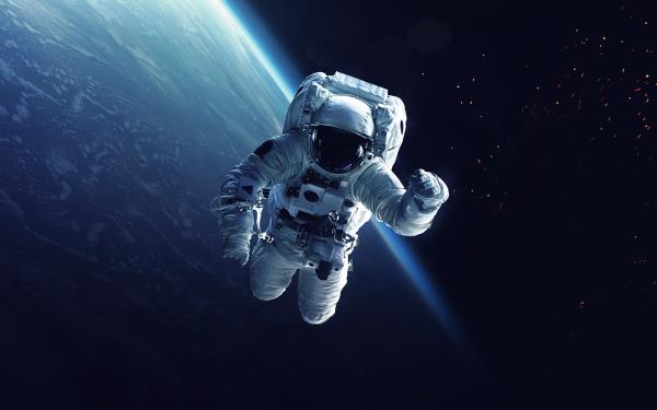 astro<em></em>naut working in space with earth in the background, did you know